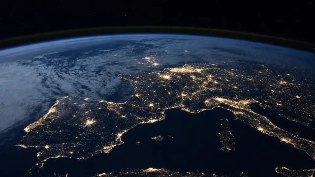 Globe of glowing connection arcs linking continents